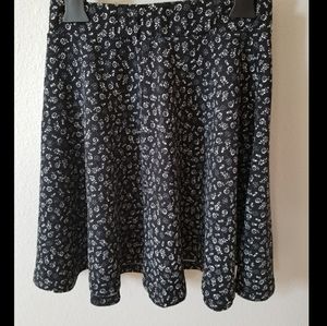 Black skirt with white flower design (Size: S)